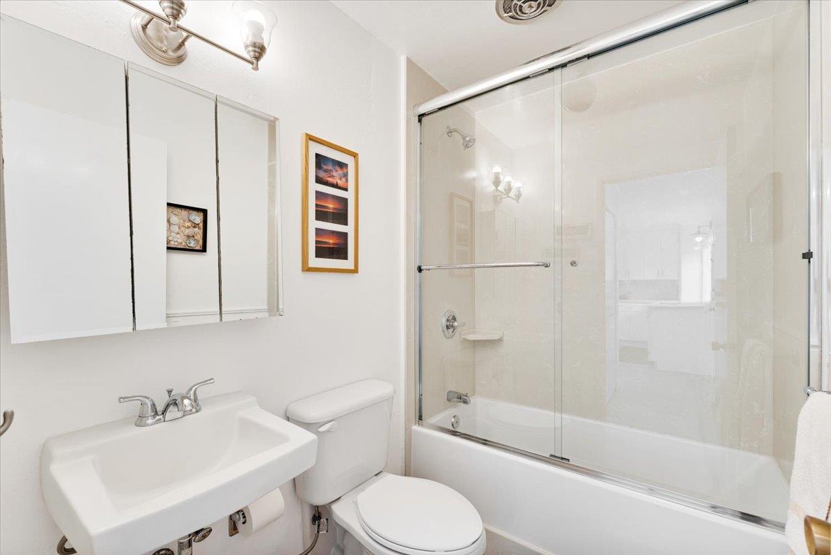 101 Shell Road, Unit 62 Watsonville, CA 95076 - Photo 21 of 38 a bathroom with a toilet sink and shower