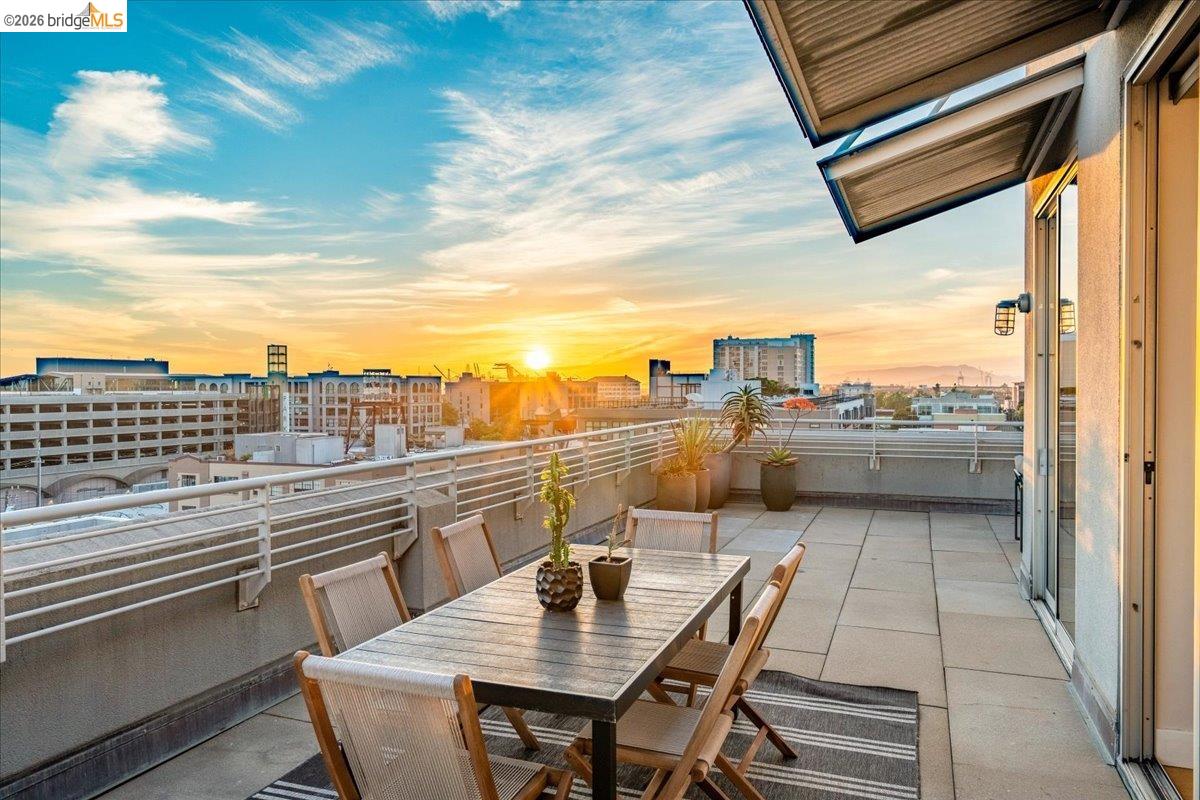 a view of a balcony with city view