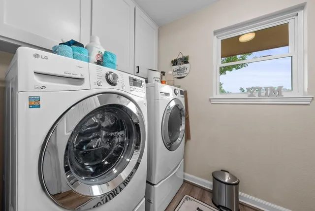 a utility room with dryer and washer