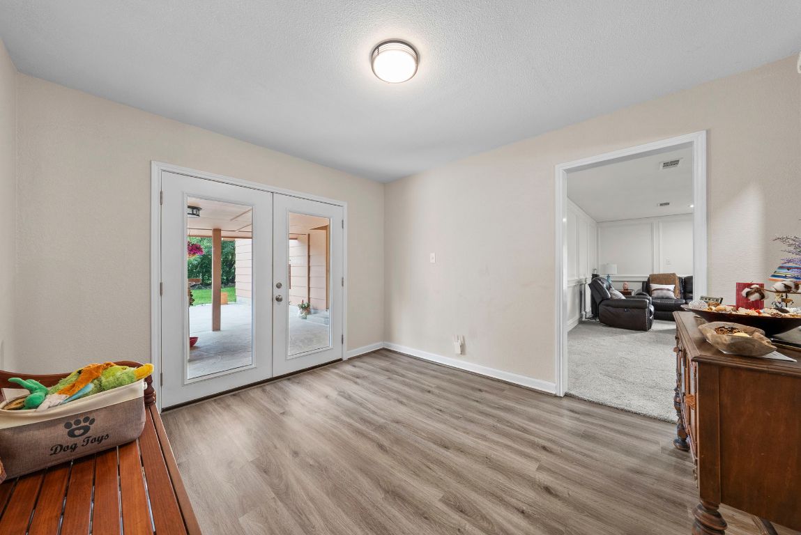 2702 Double Tree Street Round Rock, TX 78681 - Photo 16 of 35 a view of a living room and dining room