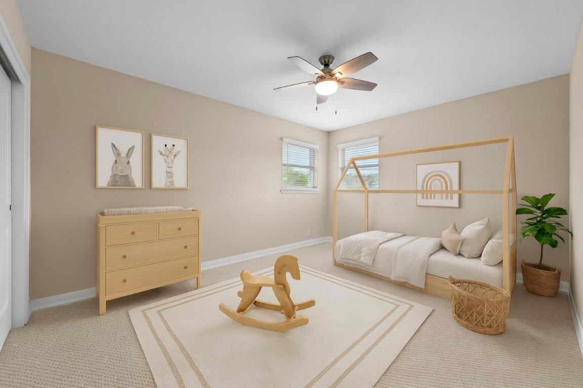 2702 Double Tree Street Round Rock, TX 78681 - Photo 25 of 35 a bedroom with a bed and window