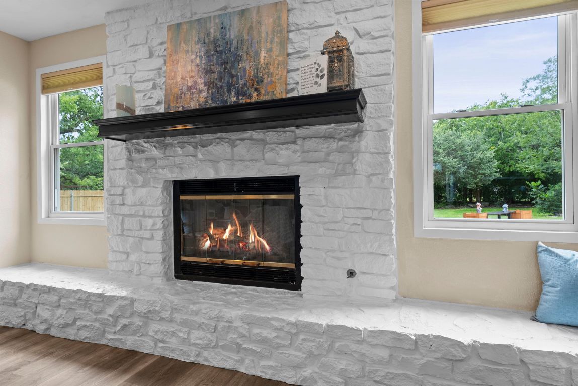 2702 Double Tree Street Round Rock, TX 78681 - Photo 5 of 35 a living room with furniture and a fireplace