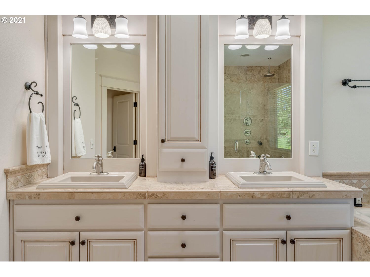 14683 Southeast Aldridge Road Happy Valley, OR 97086 - Photo 18 of 31 a bathroom with double vanity sink and mirror