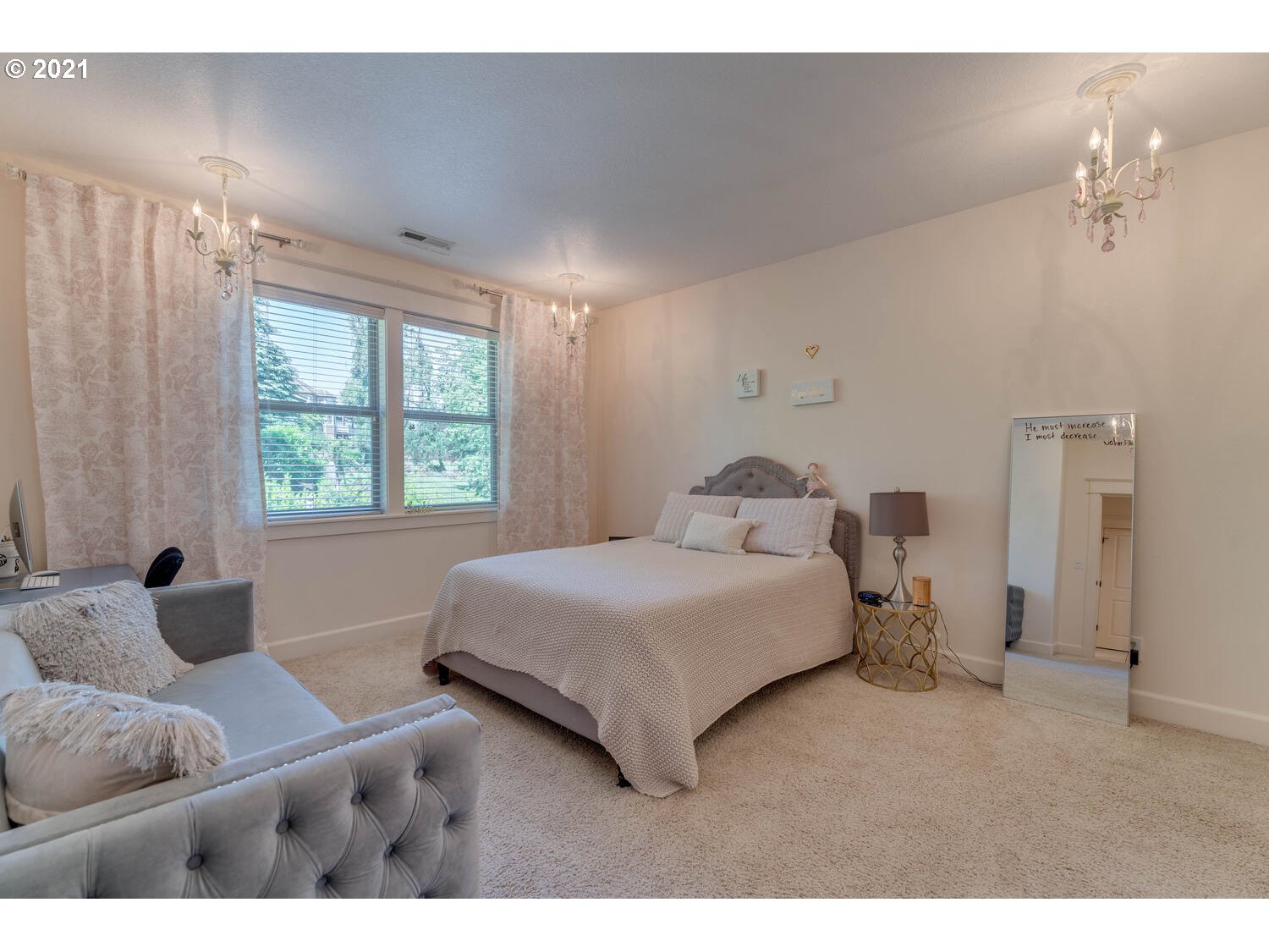 14683 Southeast Aldridge Road Happy Valley, OR 97086 - Photo 19 of 31 a bedroom with a large bed and a window