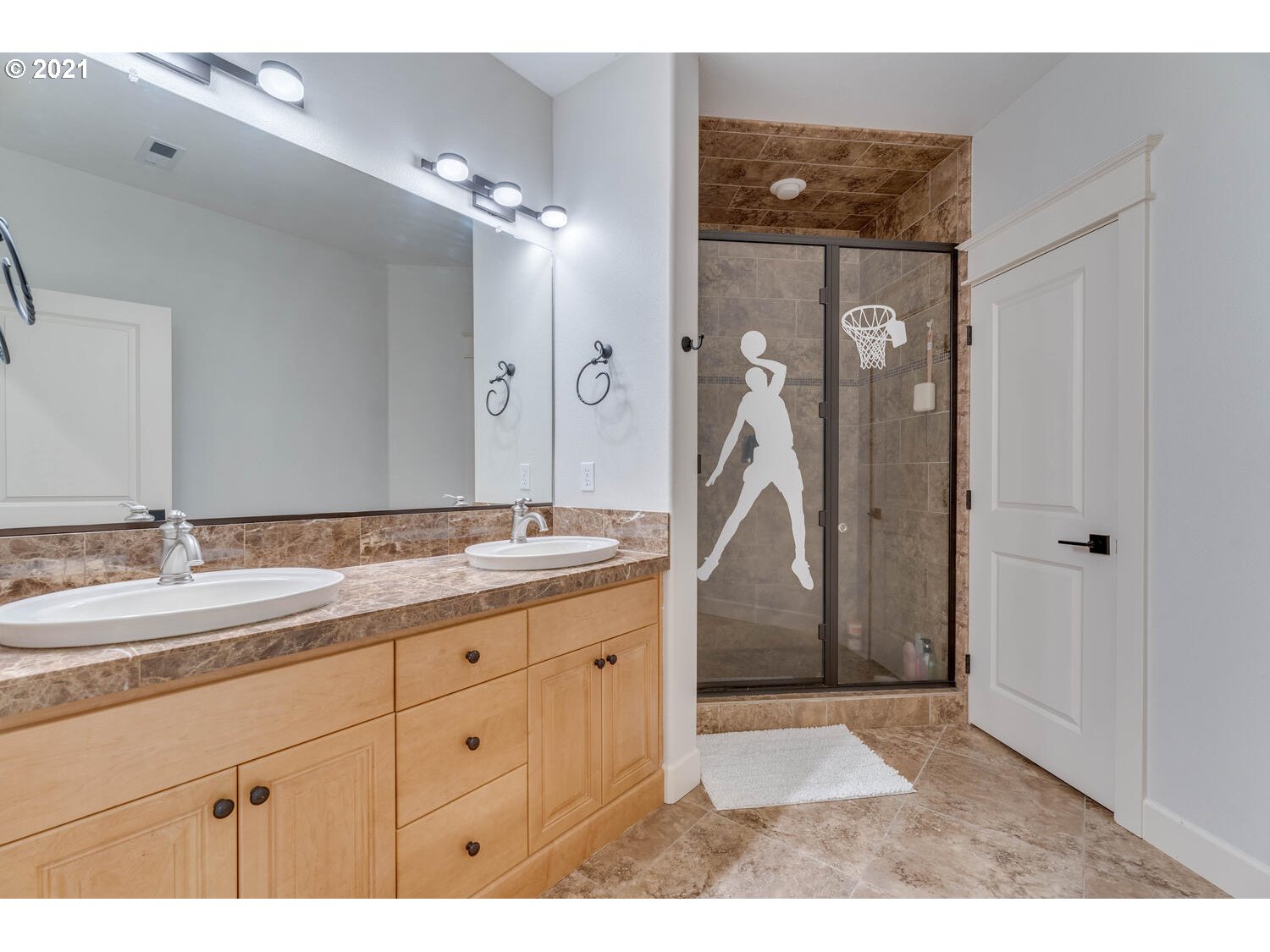 14683 Southeast Aldridge Road Happy Valley, OR 97086 - Photo 27 of 31 a bathroom with a granite countertop sink a mirror and a shower
