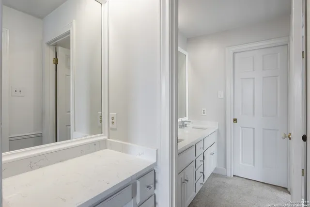 a bathroom with a sink and a bathtub