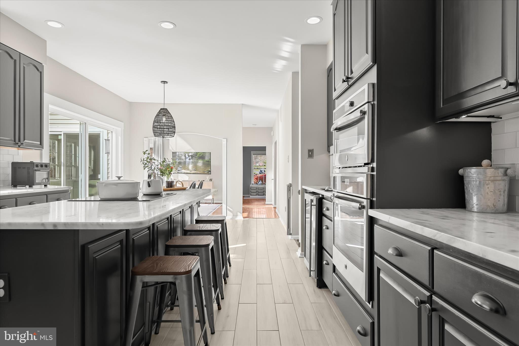 22 Farm Ridge Court Baldwin, MD 21013 - Photo 20 of 57 a kitchen with stainless steel appliances granite countertop a sink a stove and a refrigerator
