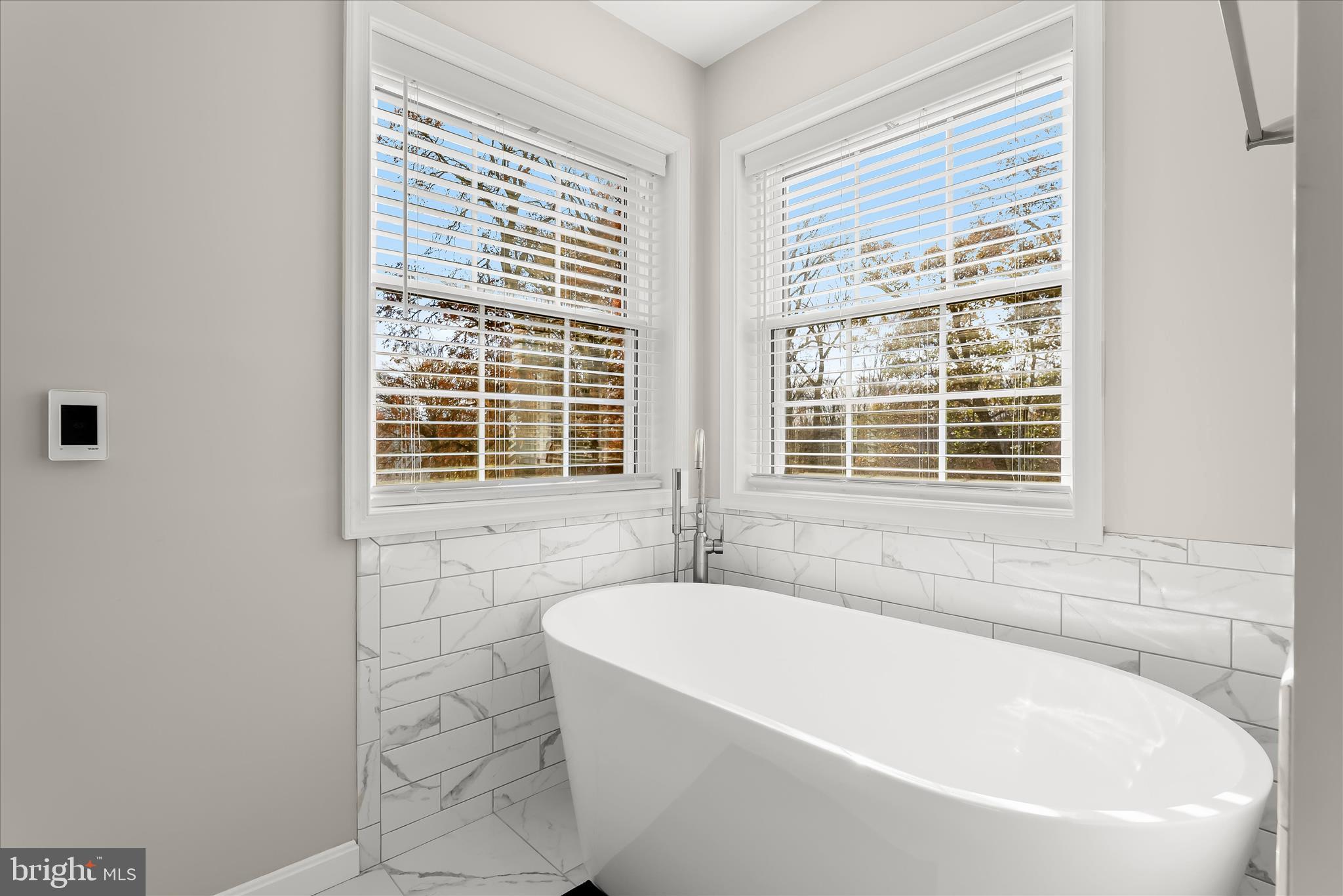 22 Farm Ridge Court Baldwin, MD 21013 - Photo 34 of 57 a white bath tub sitting next to a window