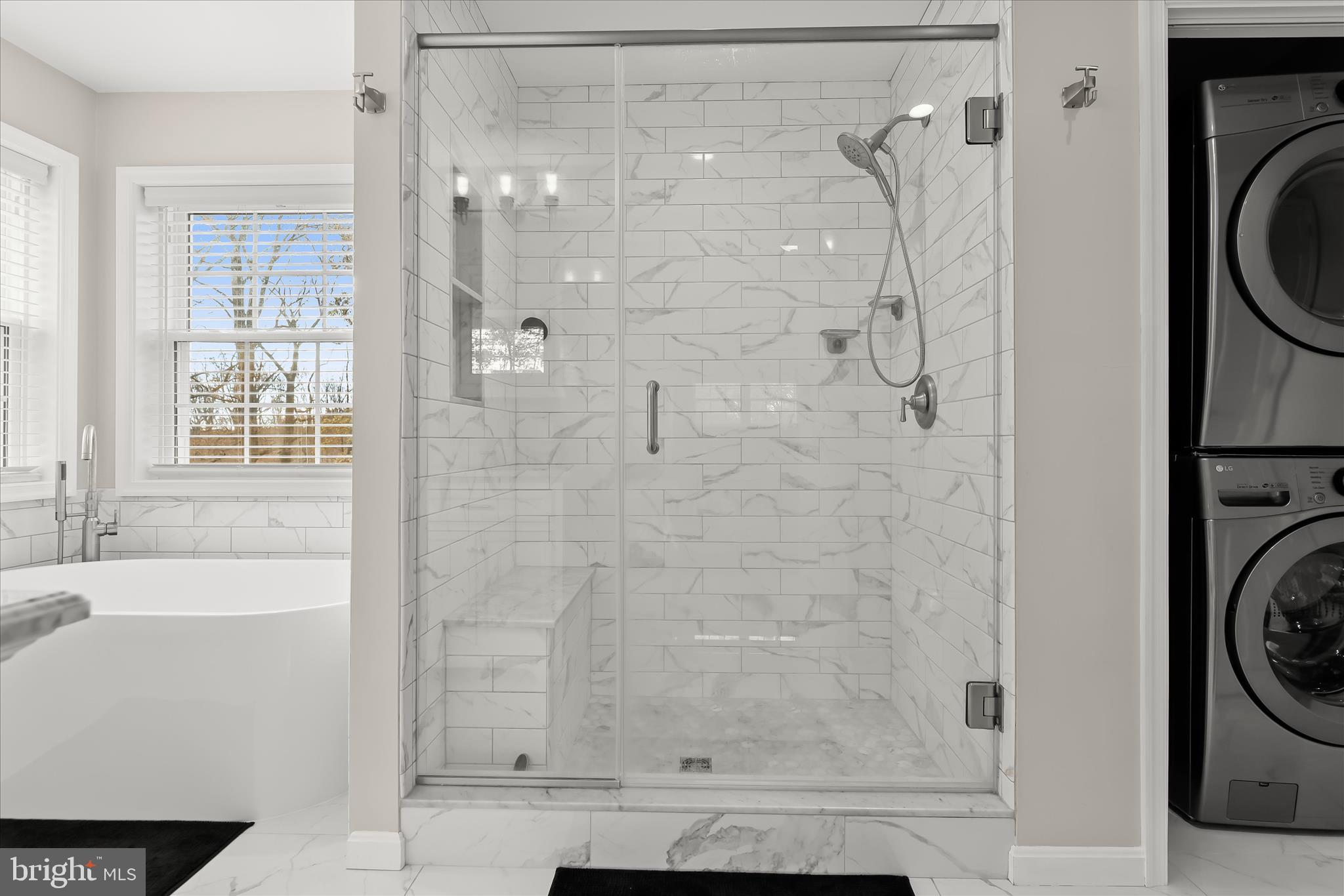 22 Farm Ridge Court Baldwin, MD 21013 - Photo 35 of 57 a bathroom with a bathtub and a shower