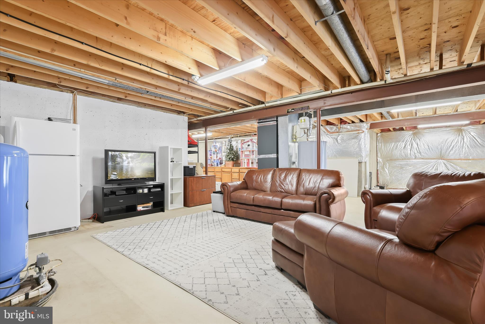 22 Farm Ridge Court Baldwin, MD 21013 - Photo 43 of 57 a living room with furniture and a flat screen tv
