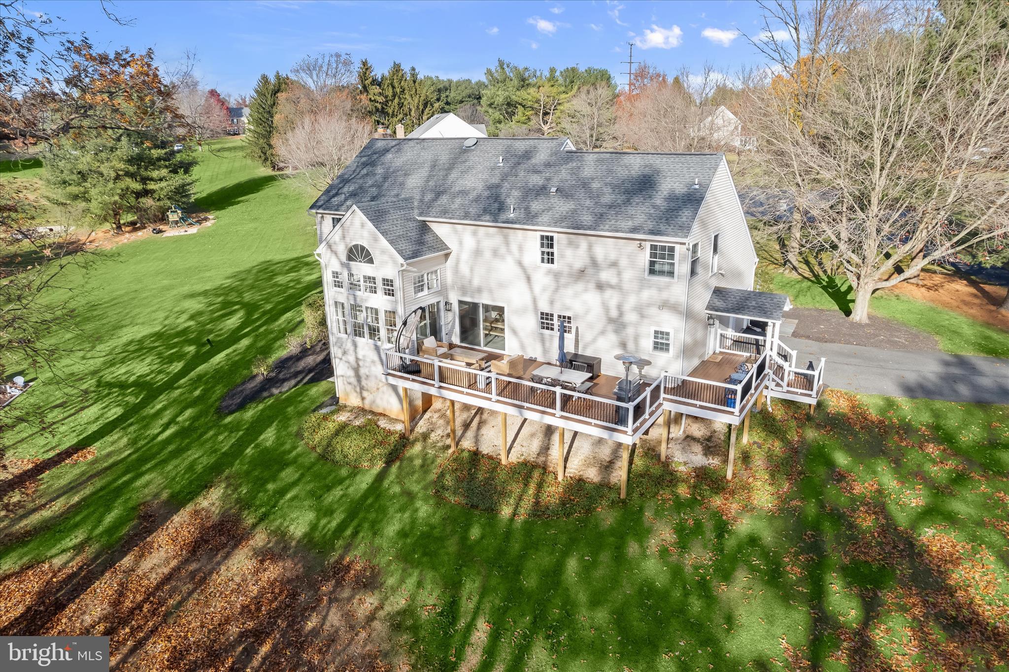 22 Farm Ridge Court Baldwin, MD 21013 - Photo 51 of 57 a view of a chairs and table in the backyard