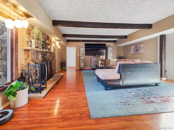 a lobby with furniture and wooden floor