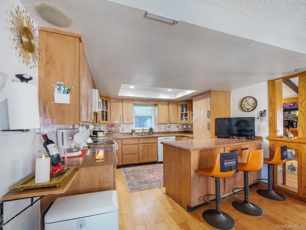 a view of a kitchen and dining room