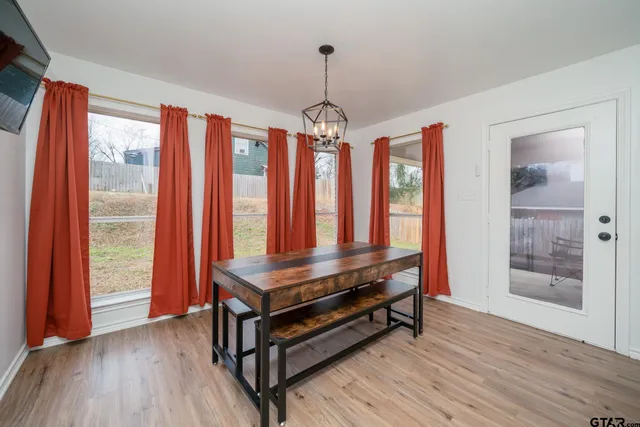 a sitting area with large window