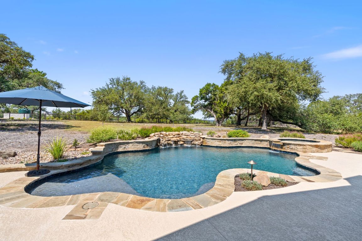 291 Southwick Ranch Road Johnson City, TX 78636 - Photo 33 of 40 View of pool featuring a patio and a pool with spa