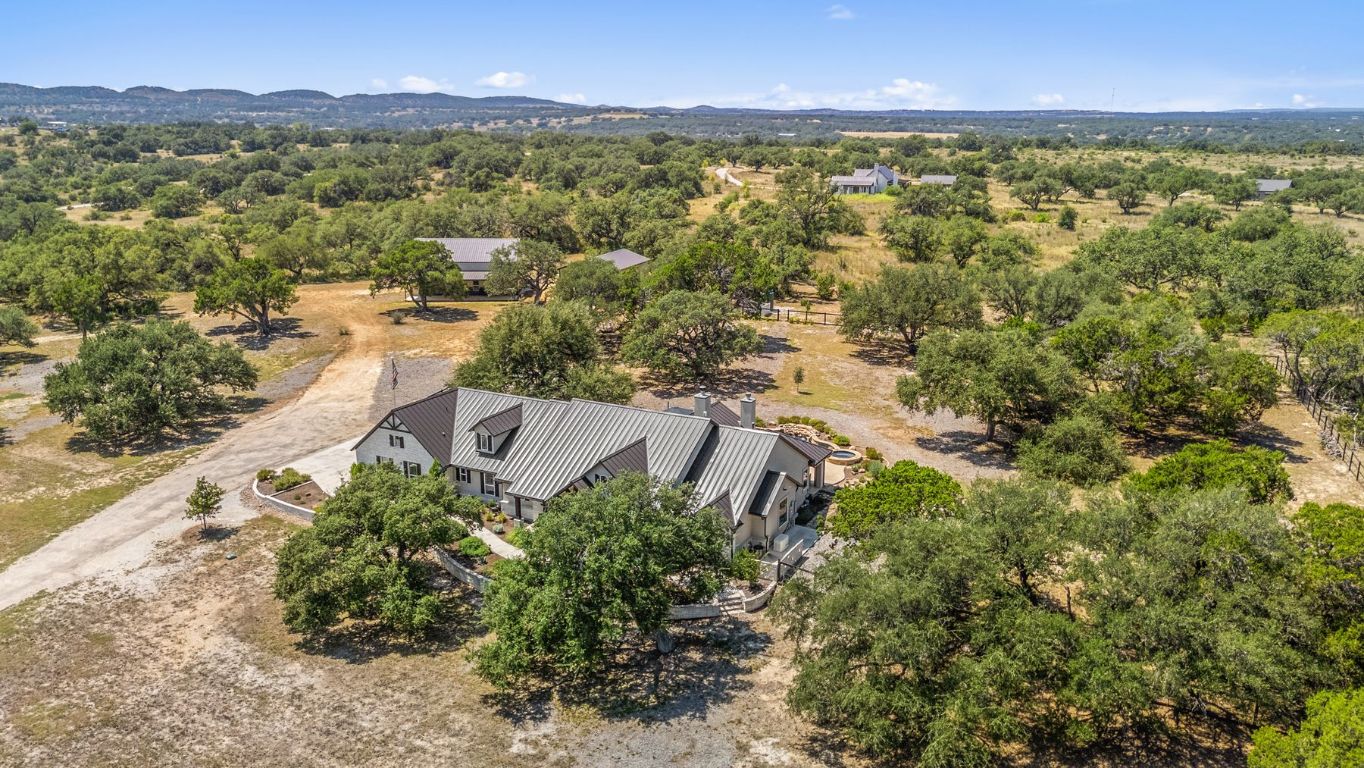 291 Southwick Ranch Road Johnson City, TX 78636 - Photo 5 of 40 Overview of rural landscape featuring a mountain backdrop