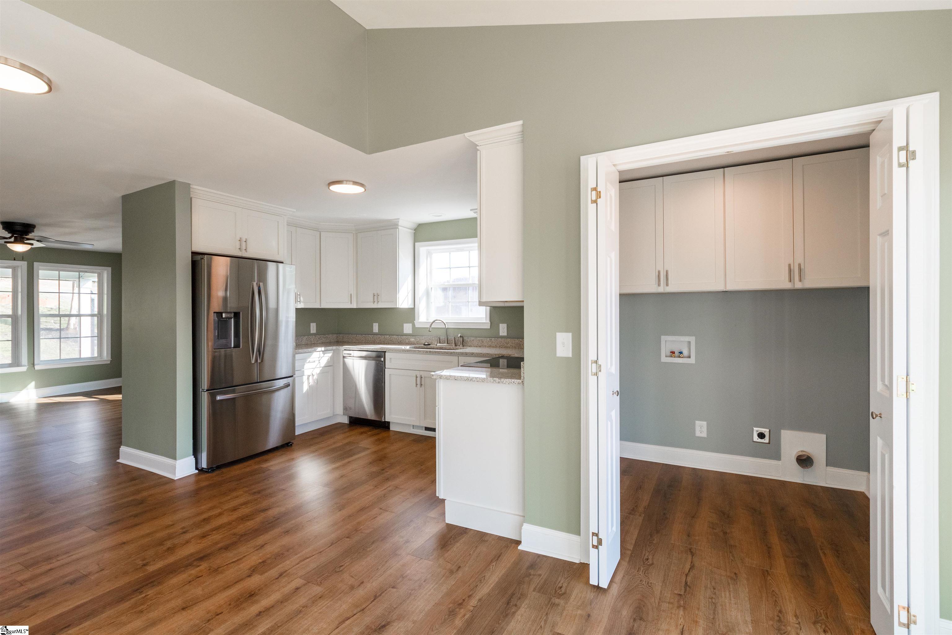 4 Maple Street Startex, SC 29377 - Photo 8 of 35 All kitchen appliances present do convey with sale of the property. Adjacent to the kitchen do not miss your walk-in laundry with built in cabinets.