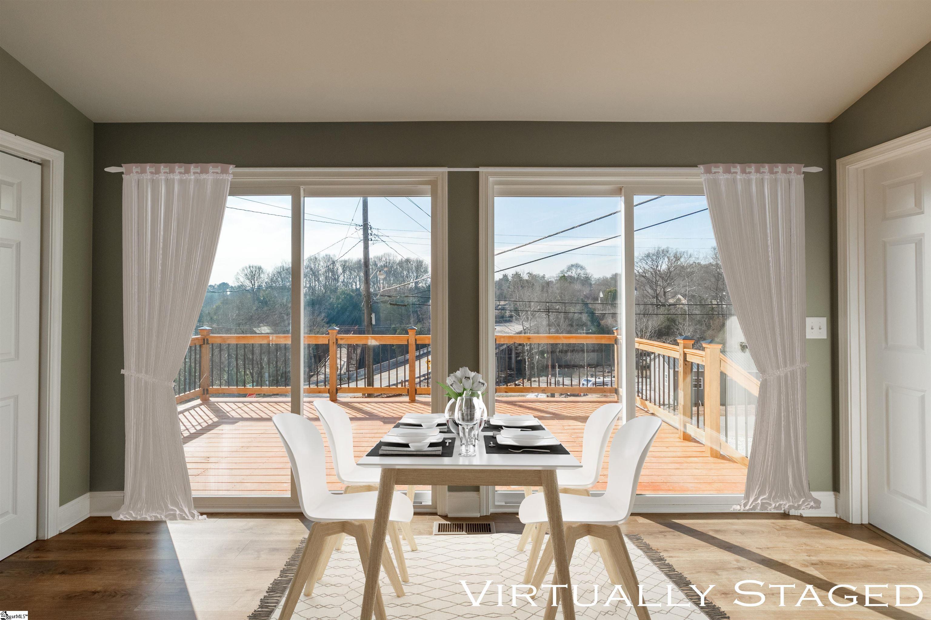 4 Maple Street Startex, SC 29377 - Photo 9 of 35 Natural Light flows into the home bring the Outdoors In through the 2 sets of sliding doors.