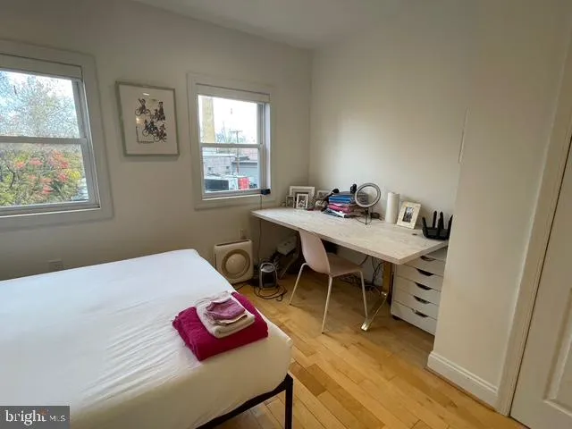a en suite bathroom with a toilet sink and shower curtain