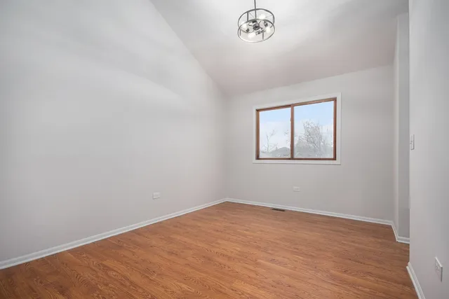 an empty room with a workspace