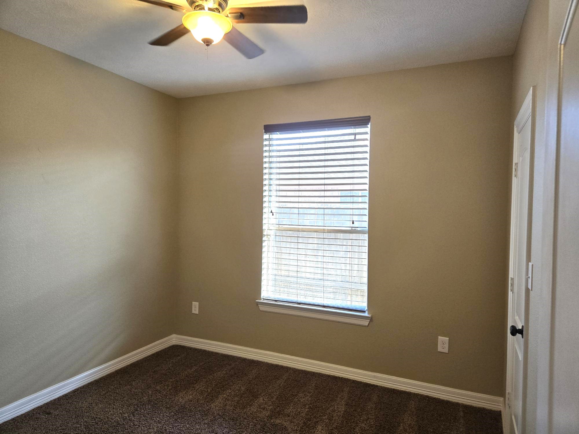 306 Masterson Street Arcola, TX 77583 - Photo 22 of 28 a view of an empty room with a window