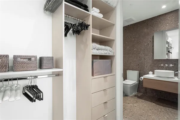 a bathroom with a sink and a toilet