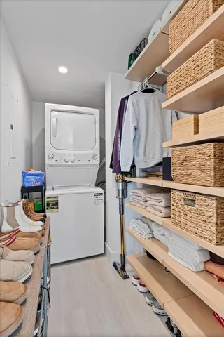 a view of storage and utility room with washer and dryer