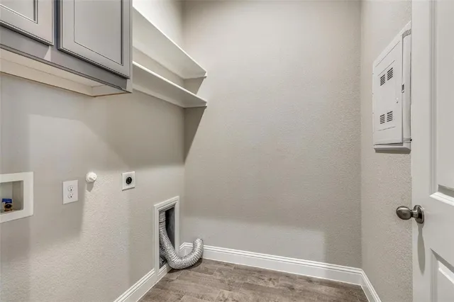 a bathroom with a granite countertop shower and a sink