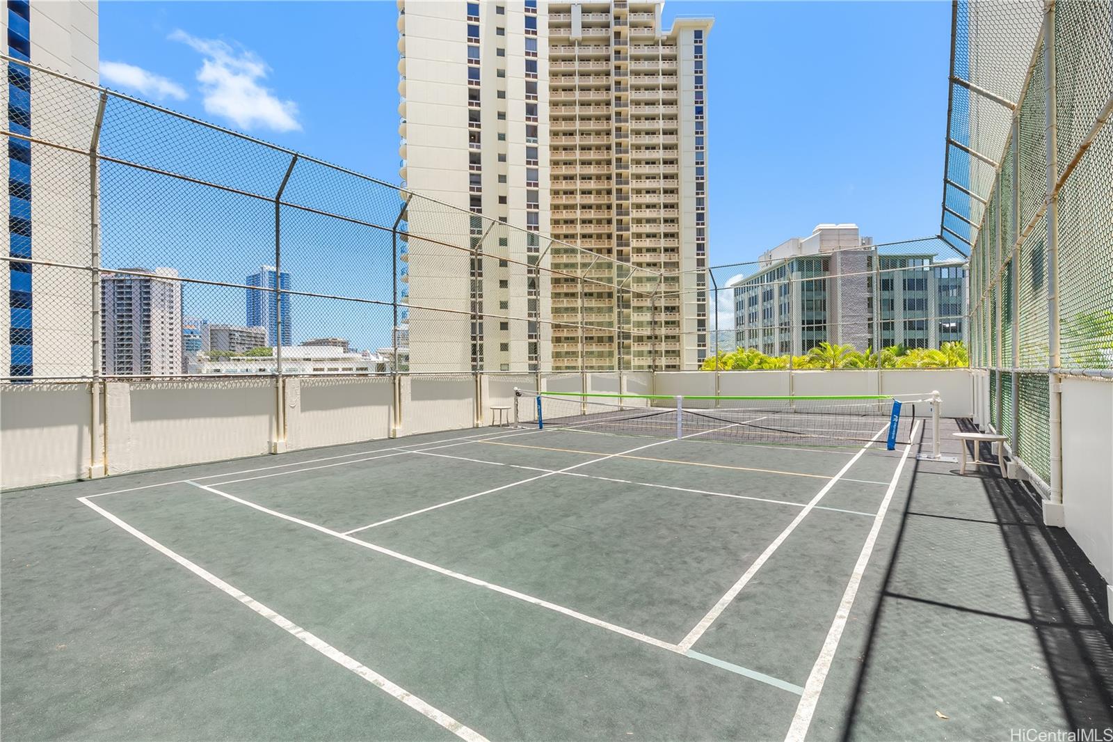 469 Ena Road, Unit 2102 Honolulu, HI 96815 - Photo 4 of 15 a view of a tennis court