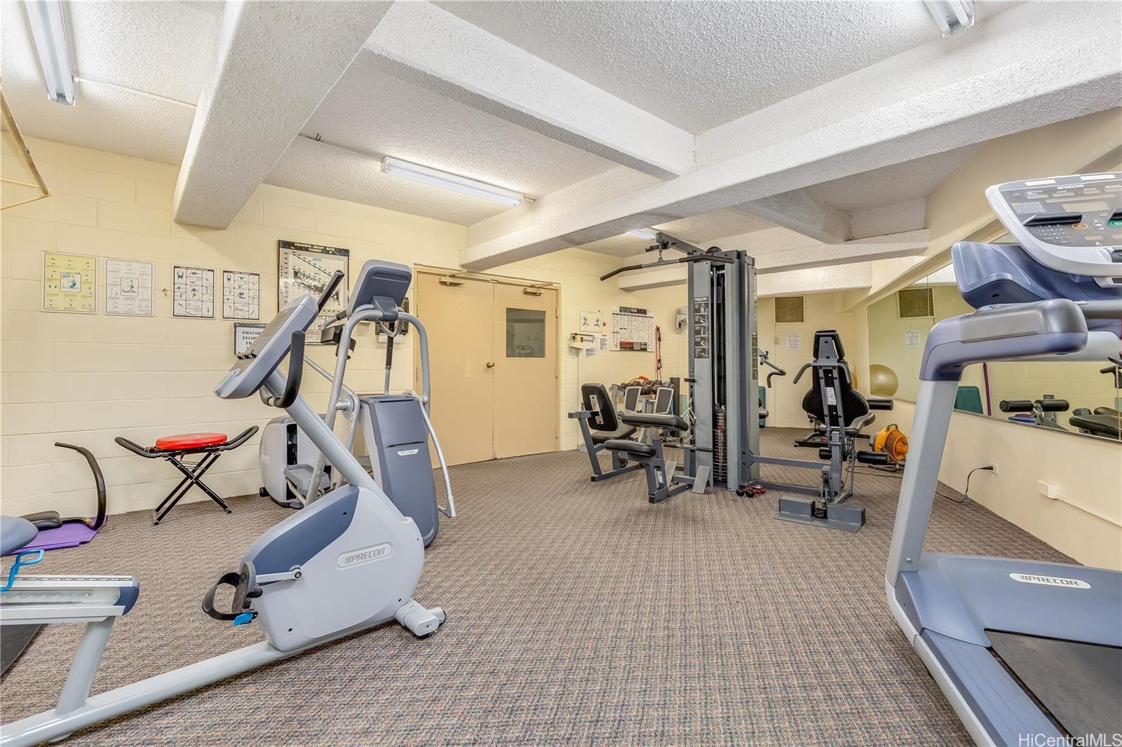 469 Ena Road, Unit 2102 Honolulu, HI 96815 - Photo 6 of 15 a view of a room with gym equipment