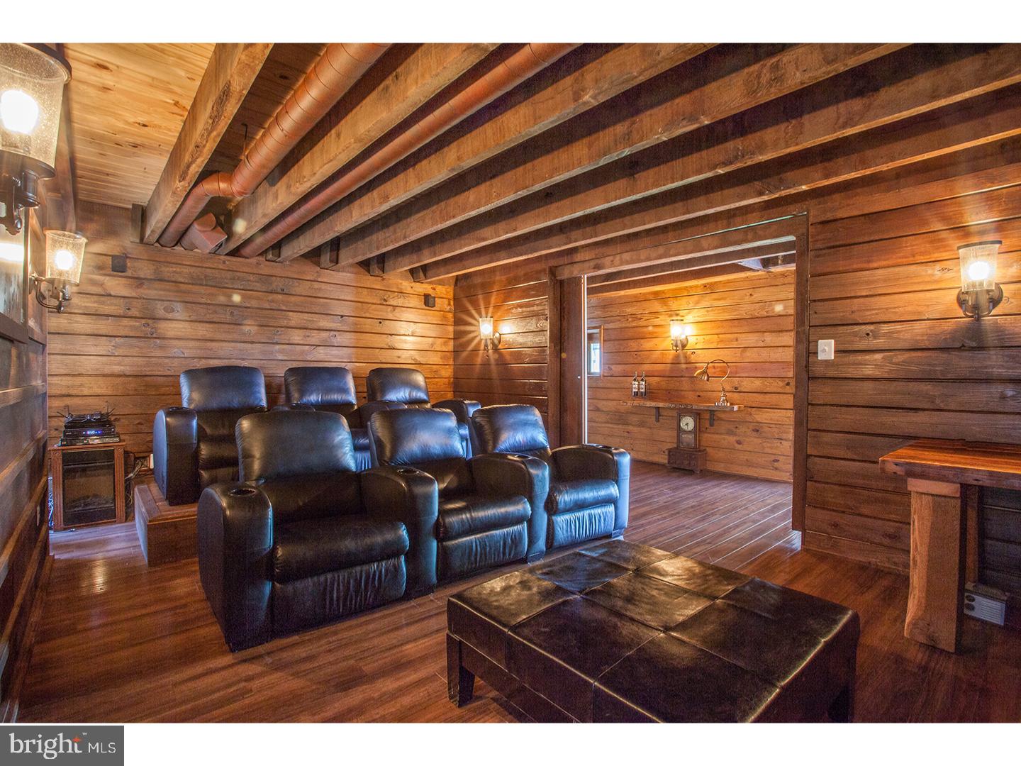 2103 Street Road New Hope, PA 18938 - Photo 12 of 25 a living room with furniture and a floor to ceiling window