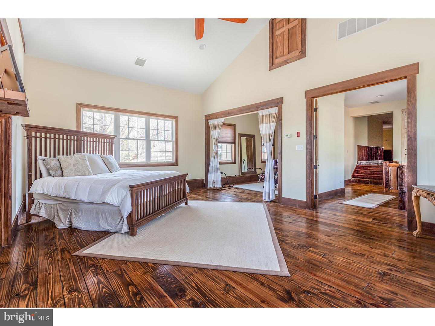 2103 Street Road New Hope, PA 18938 - Photo 18 of 25 a bedroom with furniture and a wooden floor