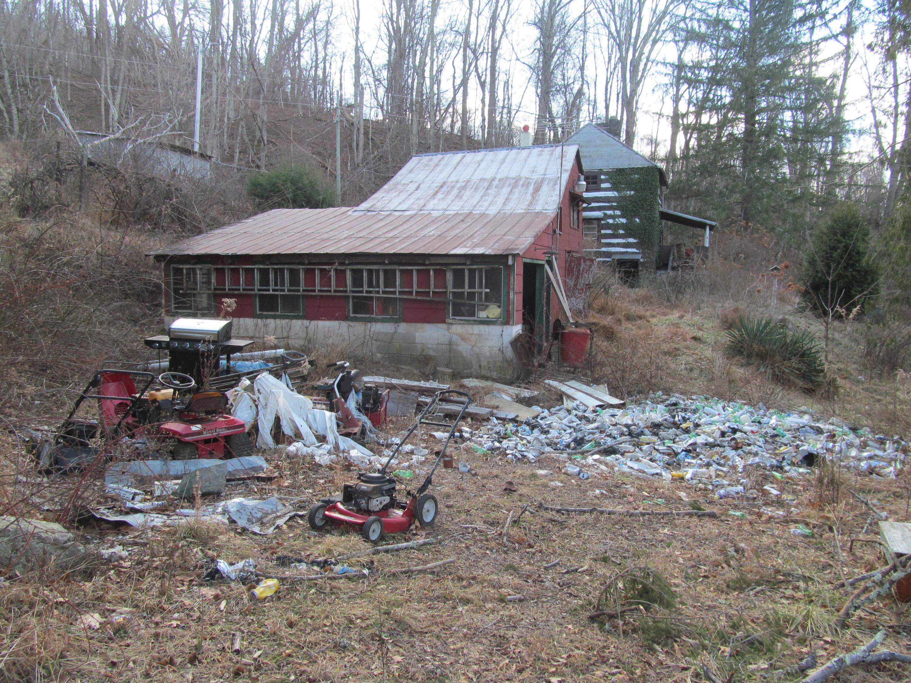 574 Grandview Road Hot Springs, VA 24445 - Photo 12 of 15 a view of a wooden house with a yard