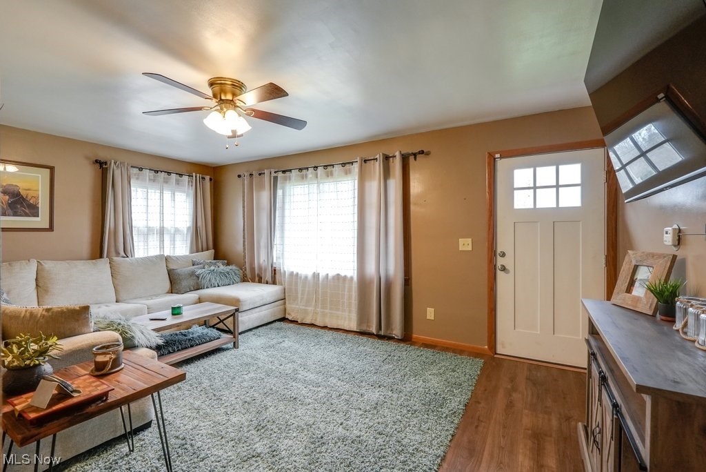 3204 Old Forge Road Kent, OH 44240 - Photo 18 of 42 Living room featuring plenty of natural light, dark wood-type flooring, and ceiling fan