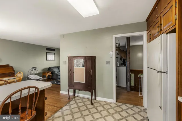 a view of a livingroom with furniture and front door