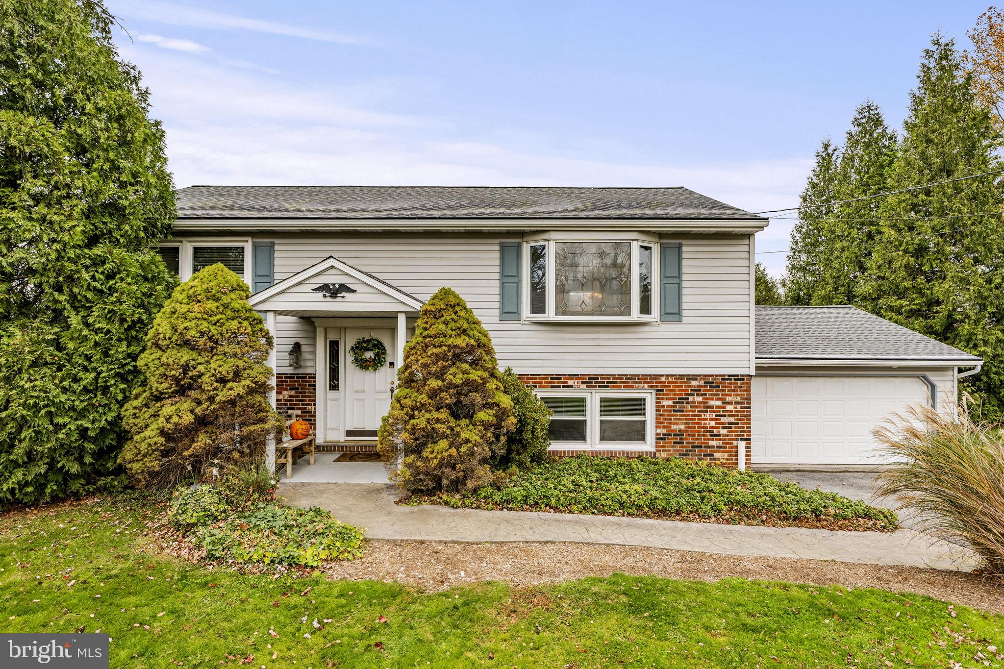 119 Harristown Road Paradise, PA 17562 - Photo 2 of 25 a front view of house with yard