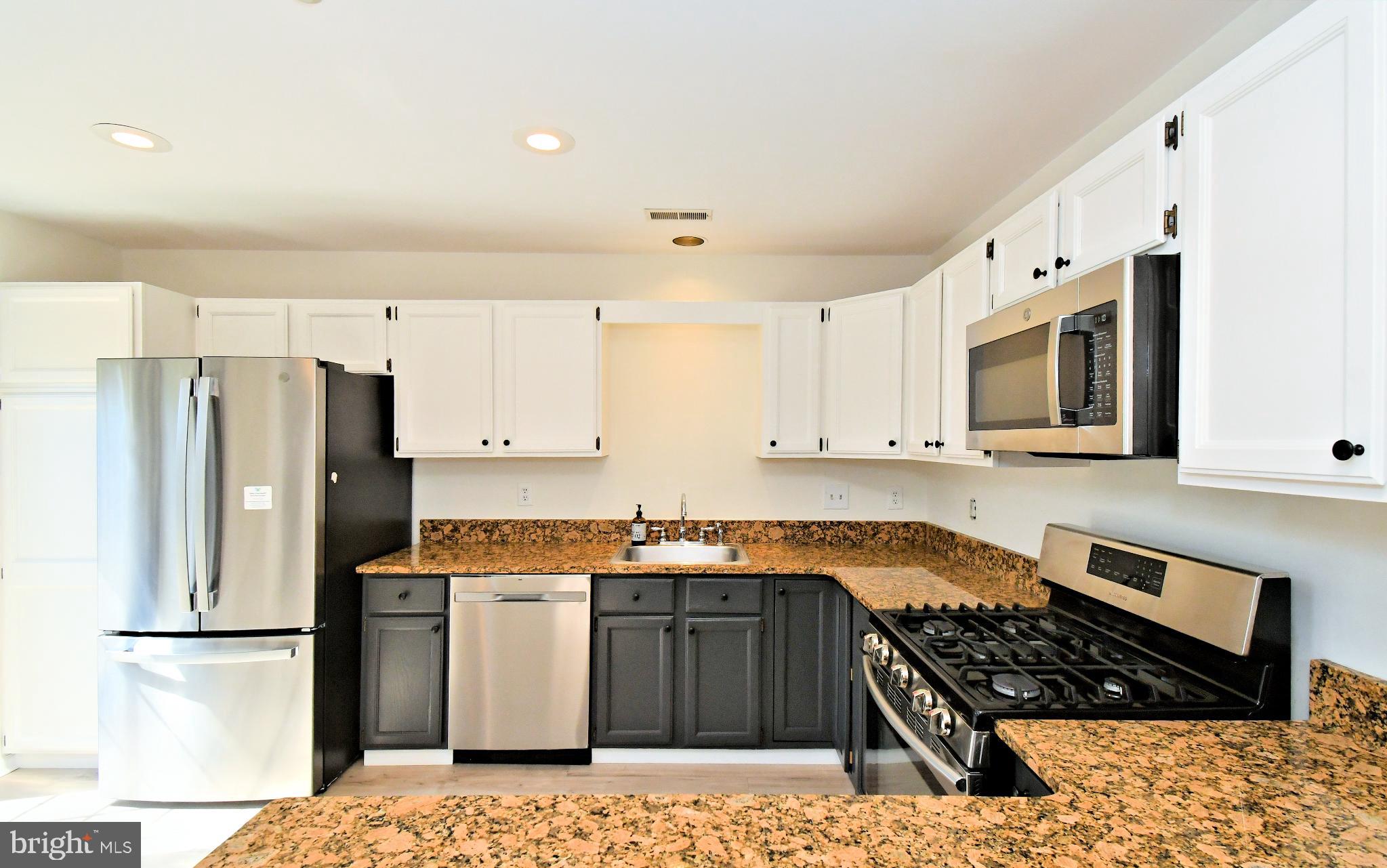 235 Valley Forge Lookout Place Wayne, PA 19087 - Photo 11 of 24 Modern kitchen with sleek finishes.