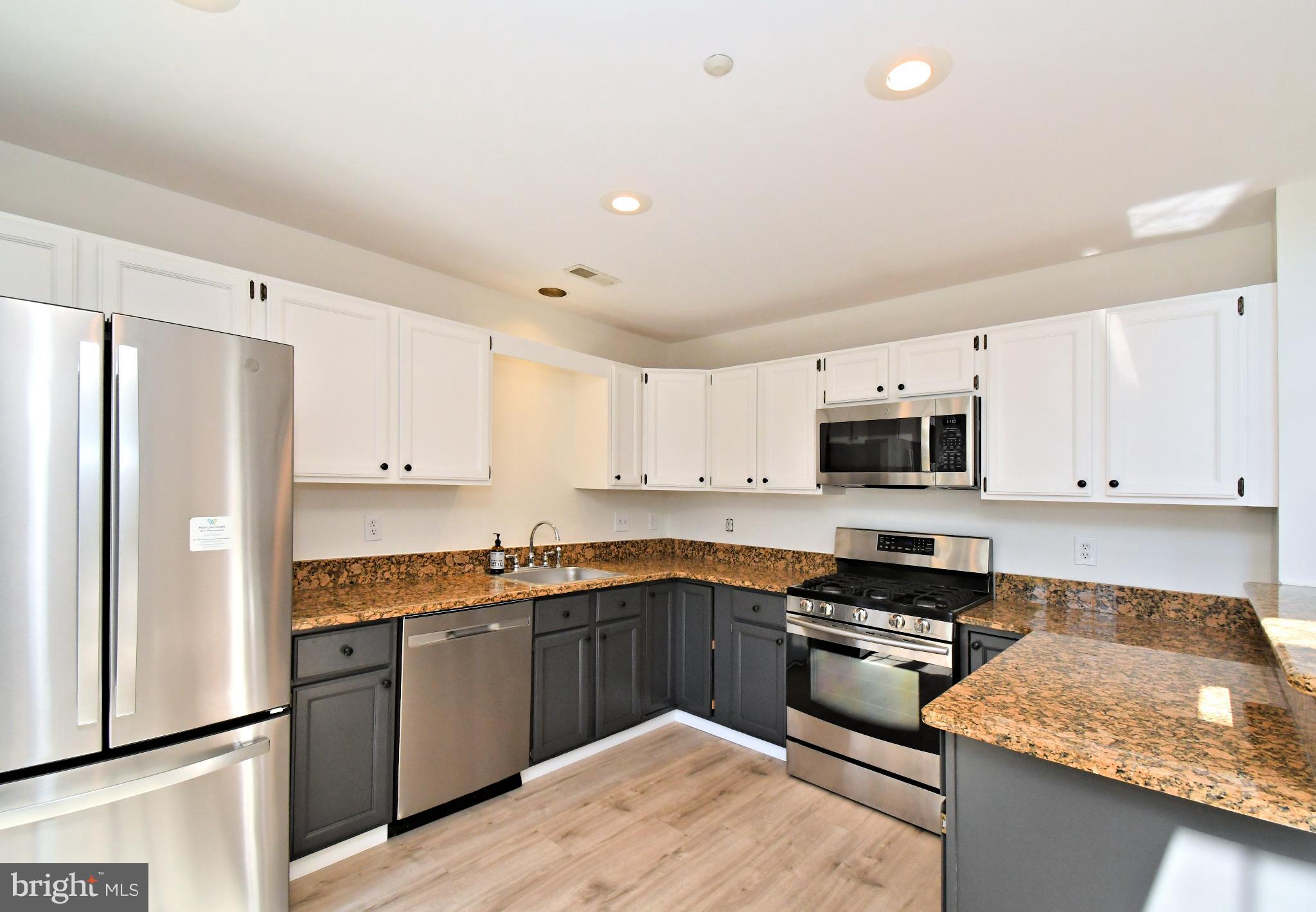 235 Valley Forge Lookout Place Wayne, PA 19087 - Photo 12 of 24 Modern kitchen with sleek finishes.