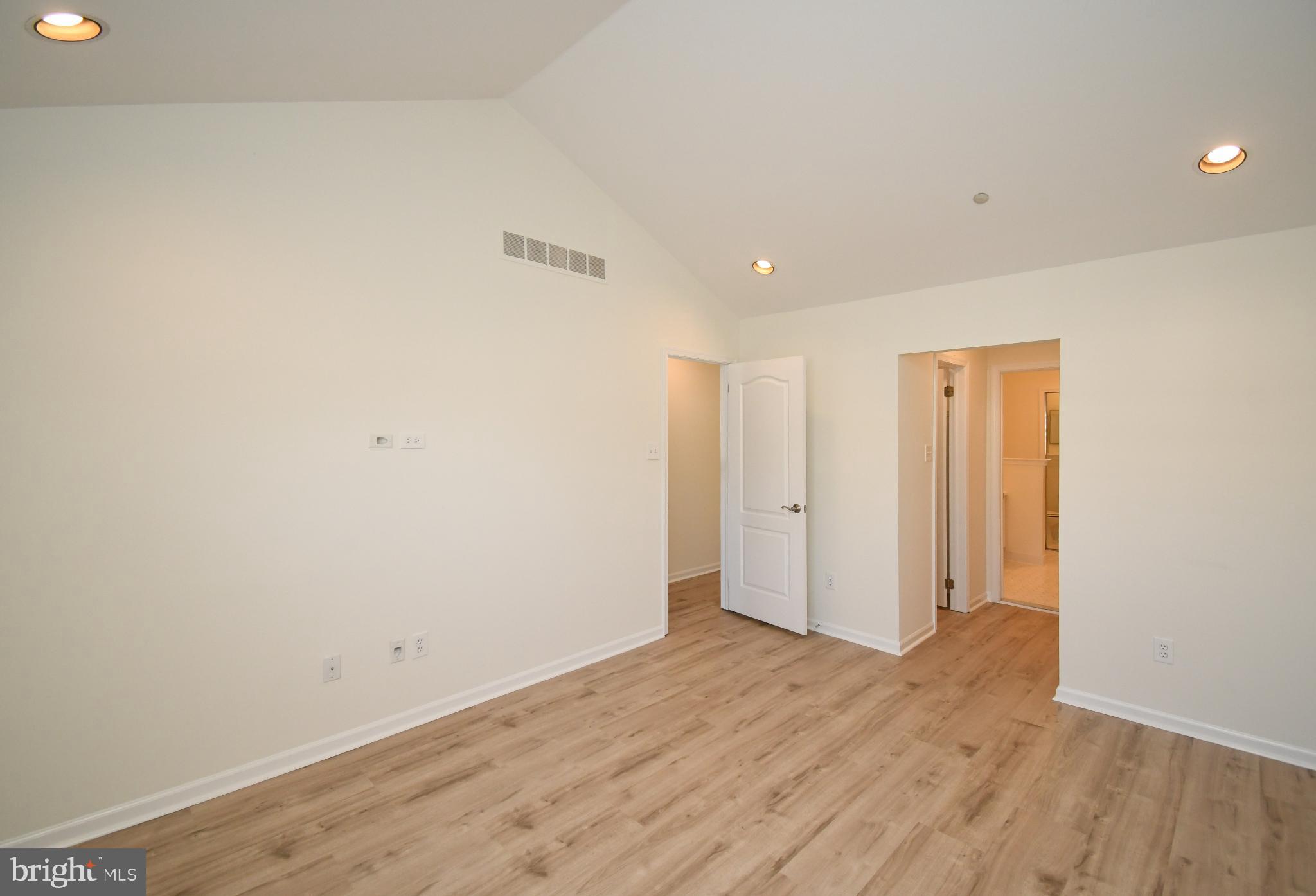 235 Valley Forge Lookout Place Wayne, PA 19087 - Photo 15 of 24 Spacious room with vaulted ceilings.