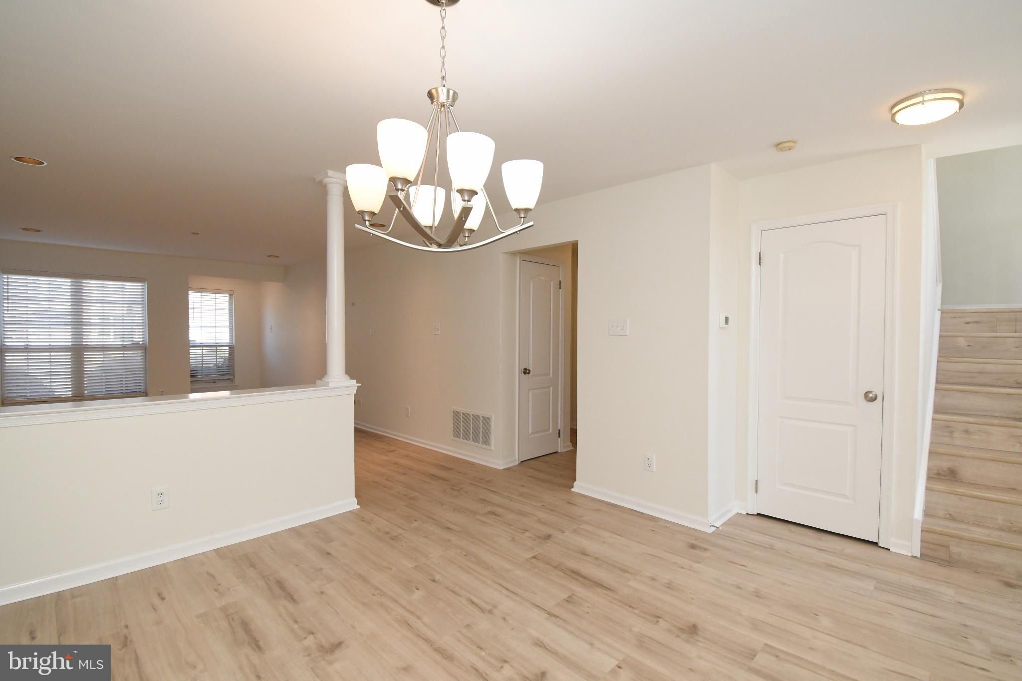 235 Valley Forge Lookout Place Wayne, PA 19087 - Photo 6 of 24 Bright and airy entryway with modern charm.