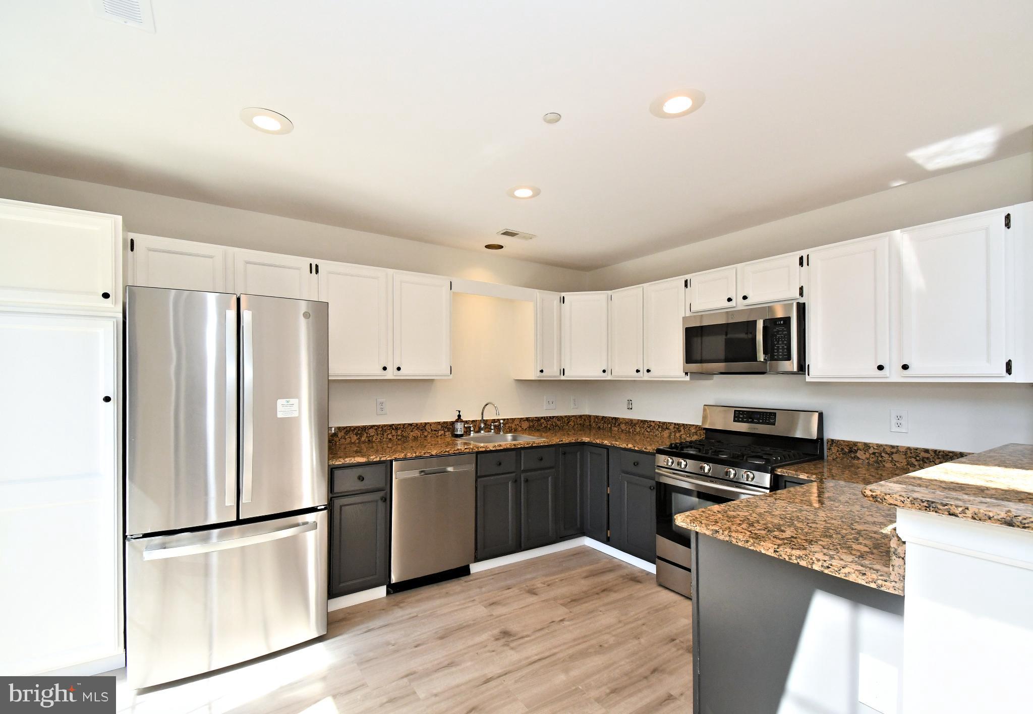 235 Valley Forge Lookout Place Wayne, PA 19087 - Photo 10 of 24 Modern kitchen with sleek finishes.