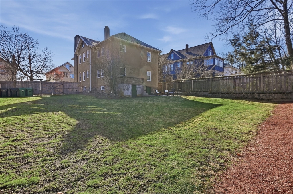 25 Spruce Street, Unit 25 Watertown, MA 02472 - Photo 34 of 39 a view of a back yard