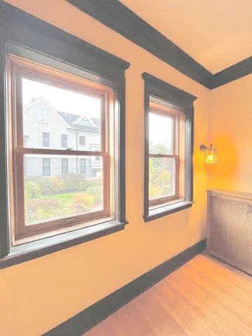 a view of an empty room and window