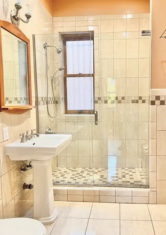 a view of an chairs and table in the patio