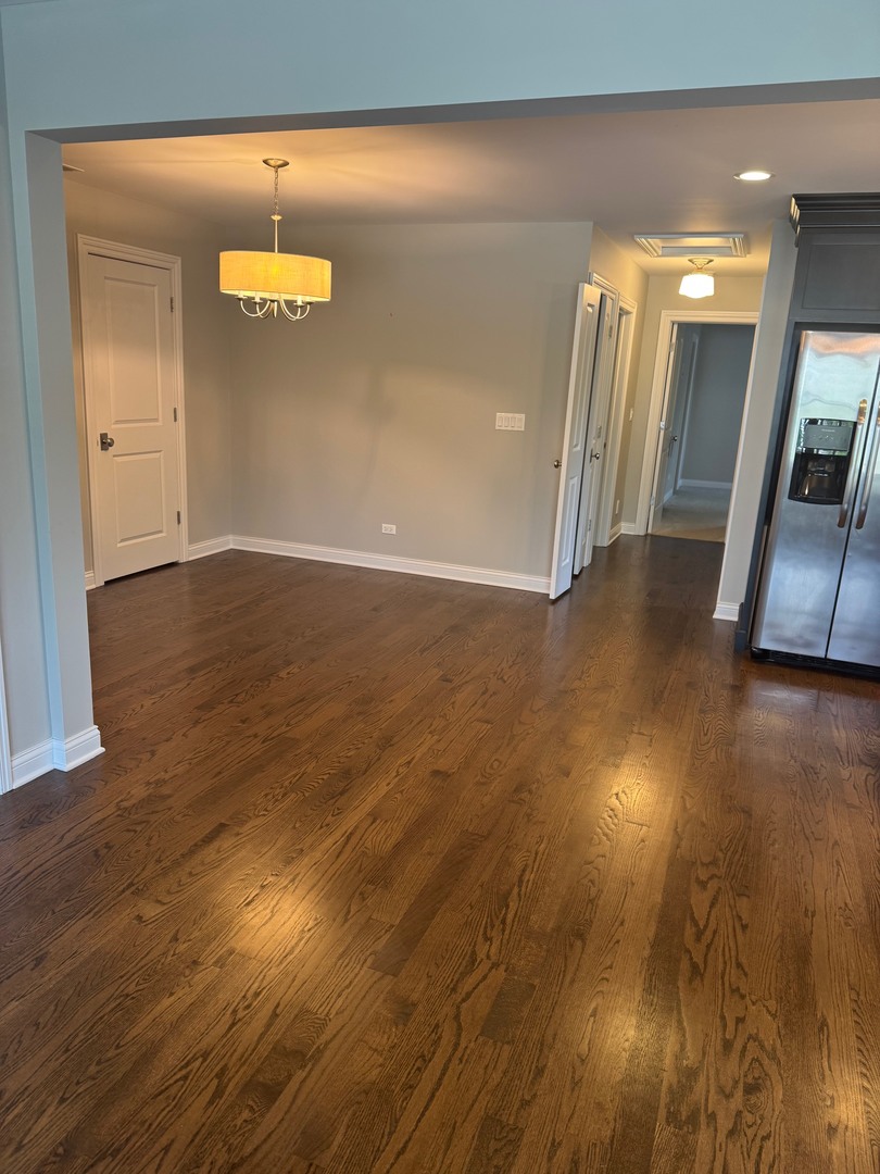 740 Chestnut Street, Unit 2 Deerfield, IL 60015 - Photo 4 of 11 a view of a room with wooden floor