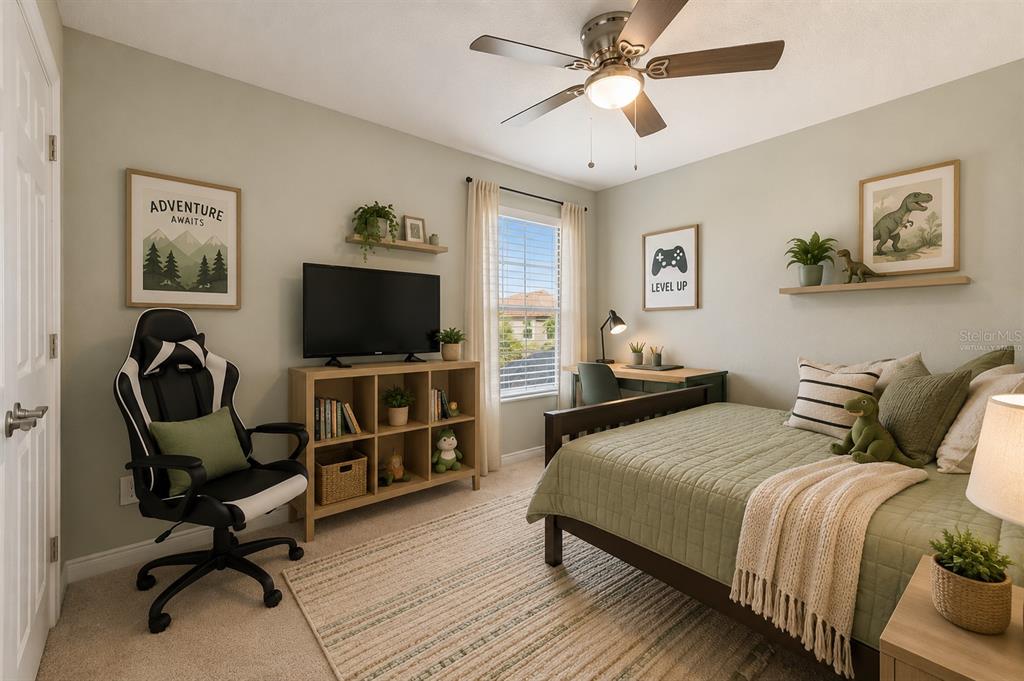 4300 Burdick Loop Odessa, FL 33556 - Photo 23 of 41 a bedroom with a bed and a flat screen tv