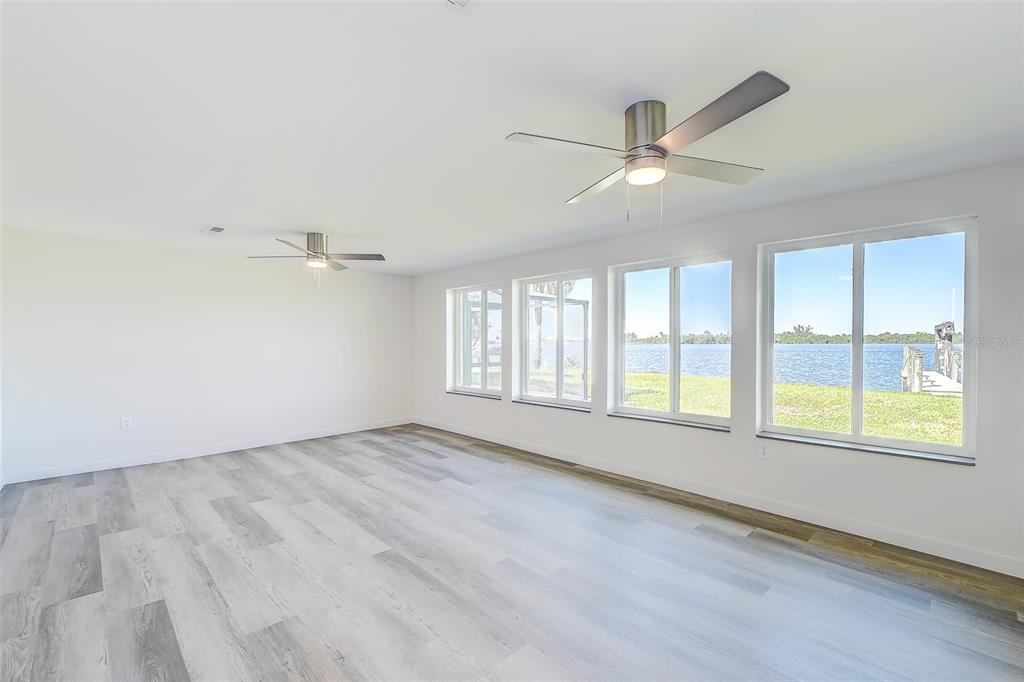 4867 East Riverside Drive Fort Myers, FL 33905 - Photo 9 of 45 a view of an empty room with a window