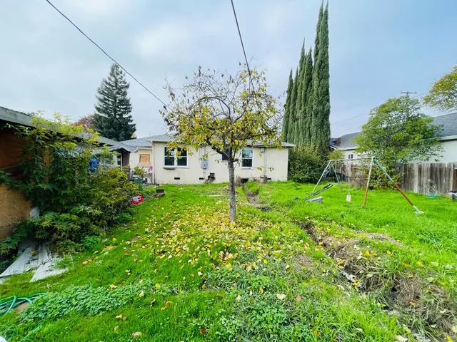 a house view with a garden space