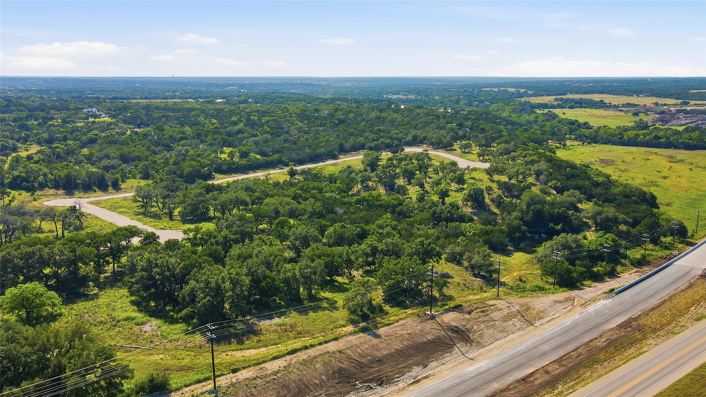 152 West Rio Rnch Road Liberty Hill, TX 78642 - Photo 25 of 27 a view of a garden from a balcony
