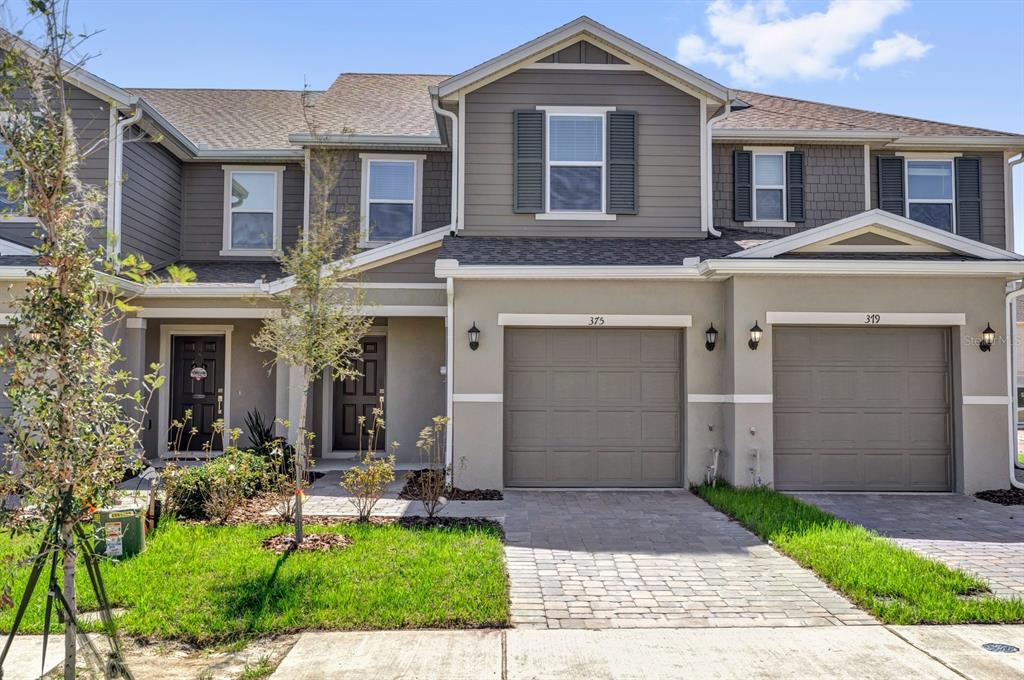 375 Sequoia Drive Lake Wales, FL 33859 - Photo 1 of 16 a front view of a house with a yard